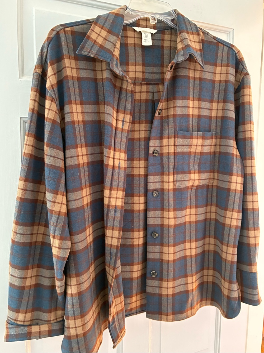Woman’s Blue and Tan Plaid Button-Up Shirt